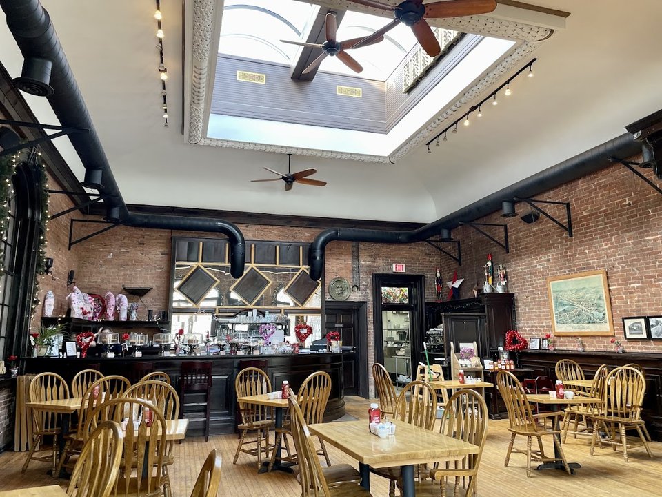 American restaurant dining room with wooden tables.